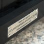 Plaque on painted planter