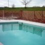 Trellis surround for swimming pool