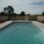 Trellis surround for swimming pool