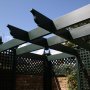 Town garden pergola painted green