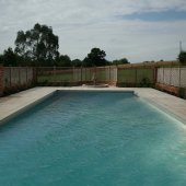 Swimming pool enclosure